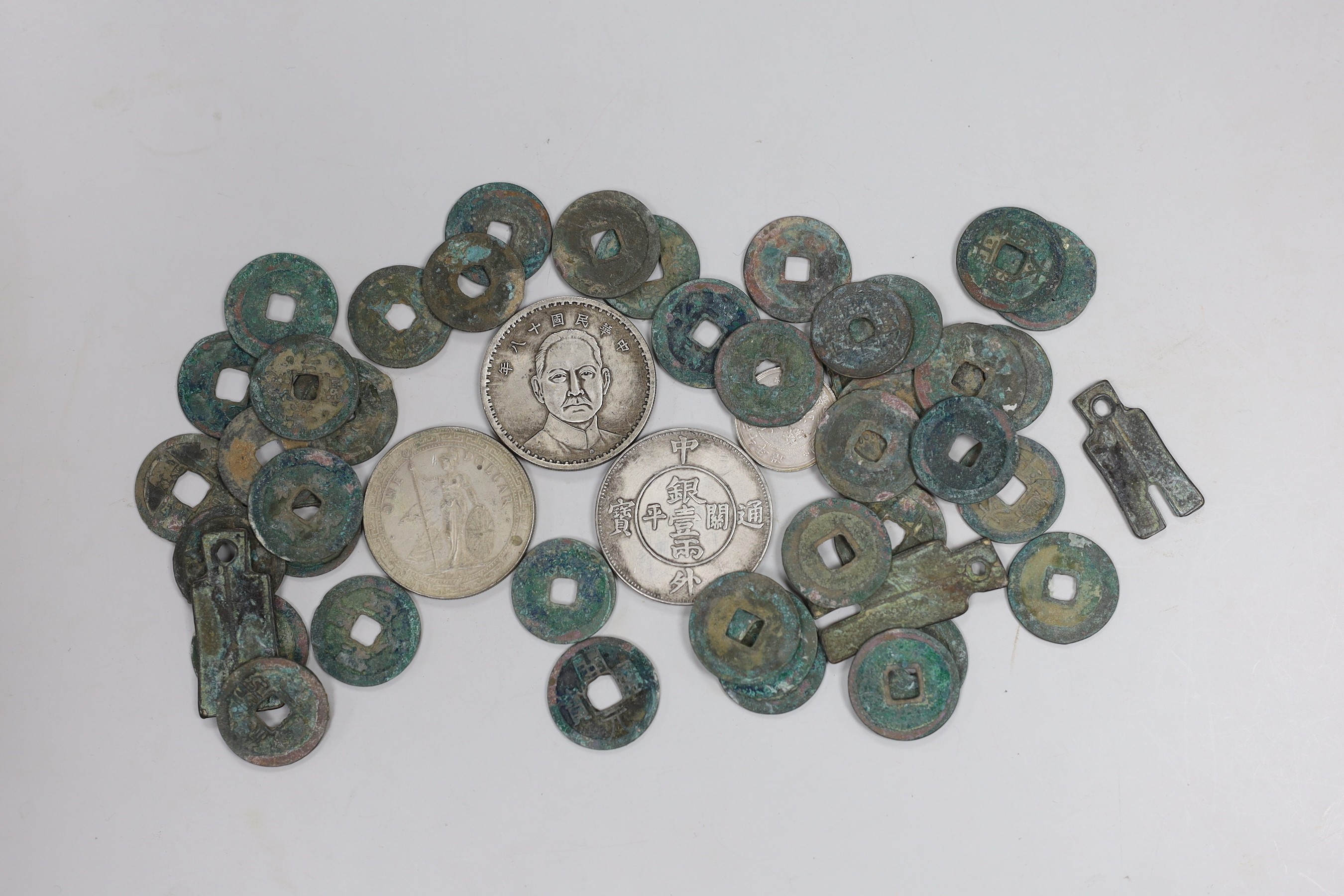 A group of various Chinese coins